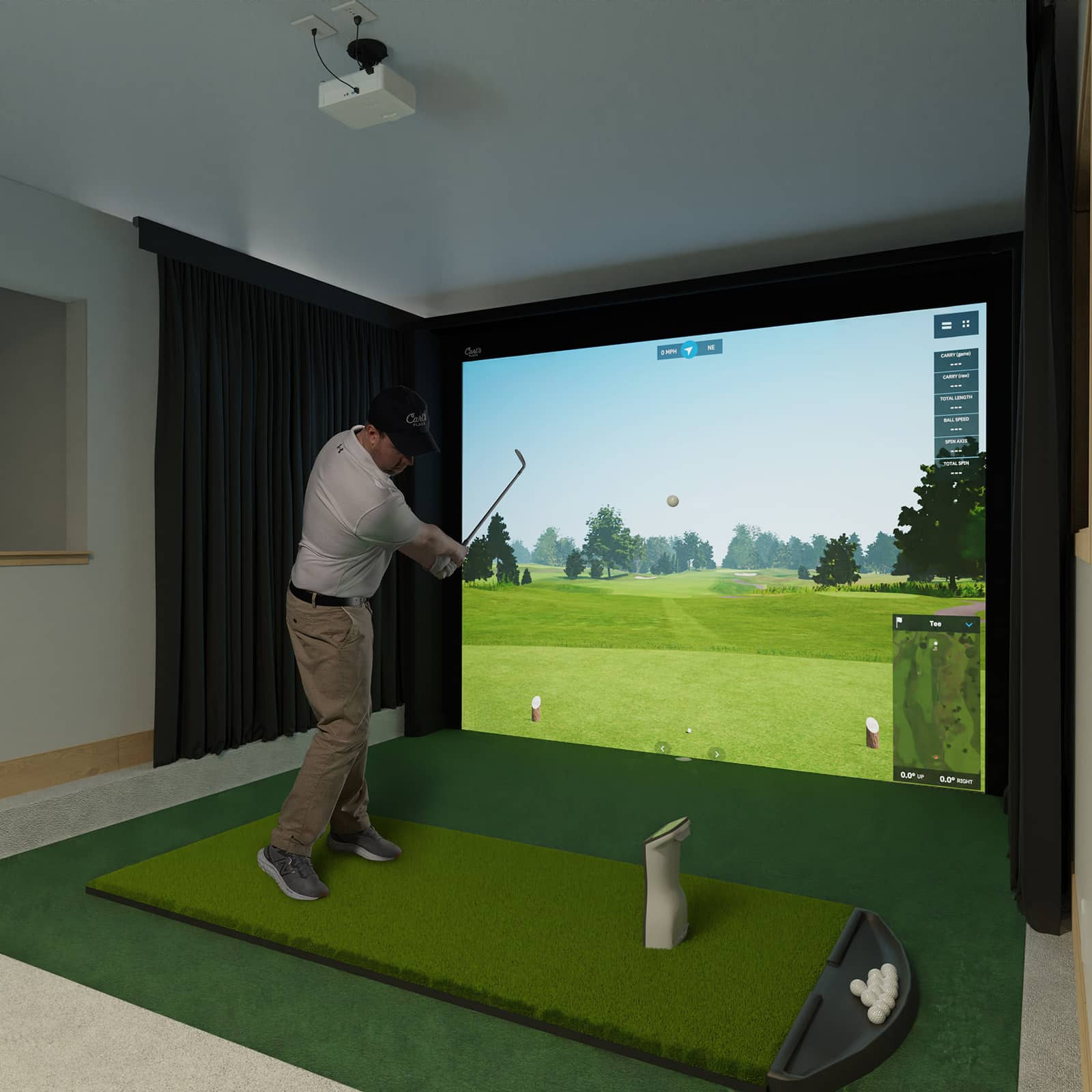 Home golfer in sunken living room using Carl's DIY Enclosure Kit