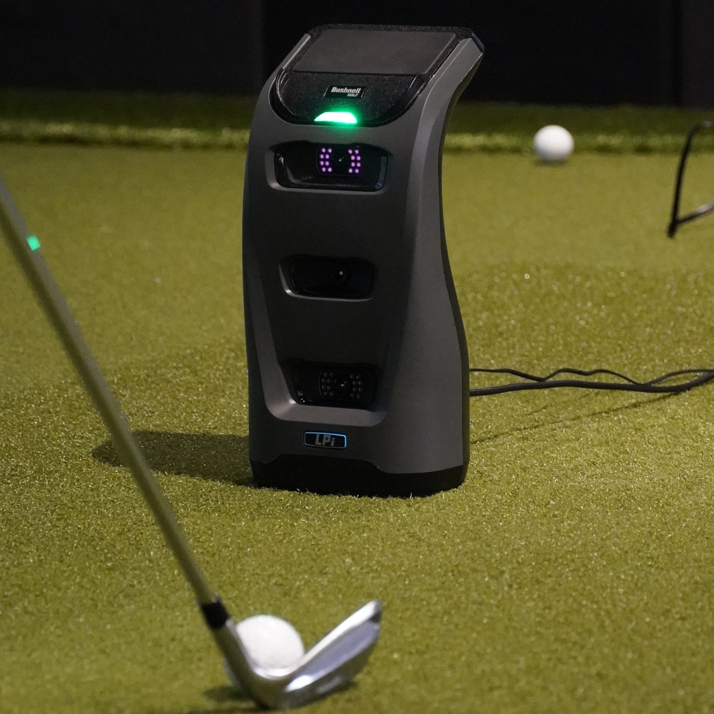 Bushnell LPi with golfer hitting the ball