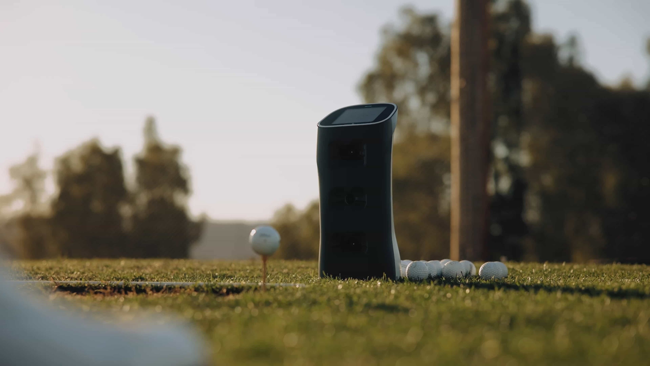 Golfer using the Spica 3 outdoors provided