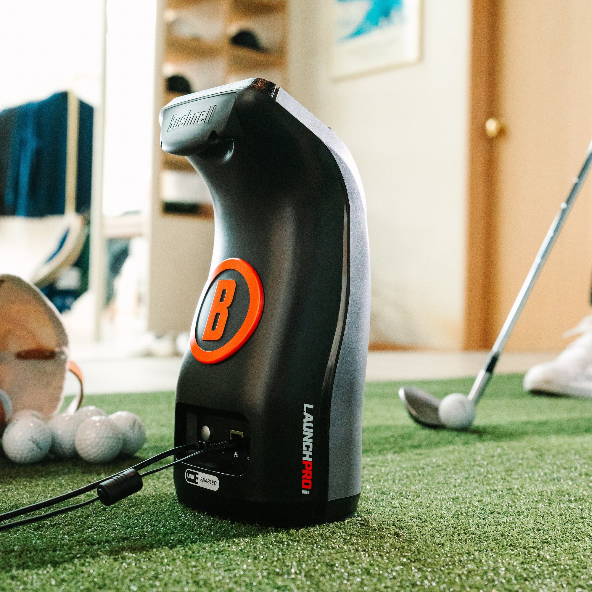 Bushnell LPi with golfer hitting the ball