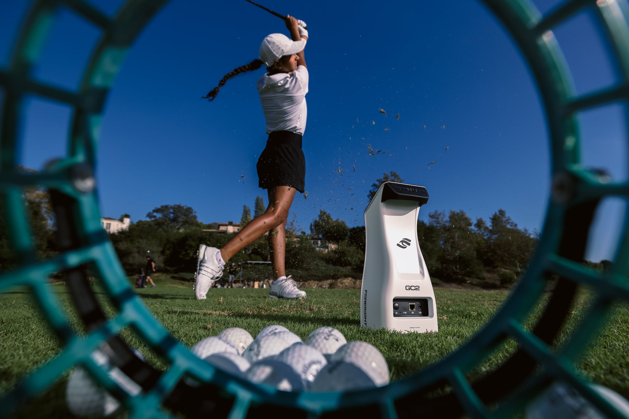 Tunnel look at golfer swinging