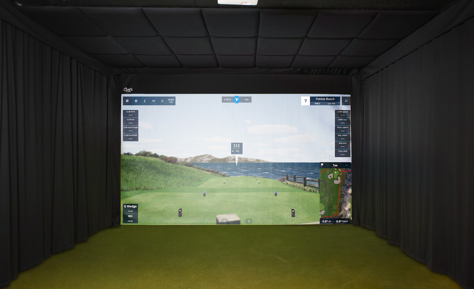 Built-In Golf Room in Basement with Curtains