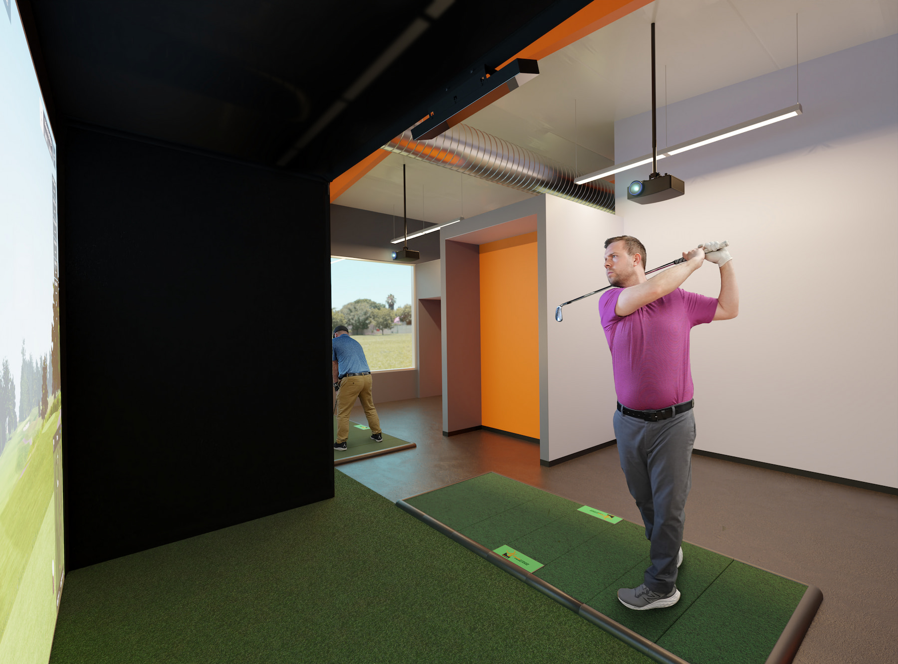 Golfing inside Pro Enclosure at a commercial indoor golf facility