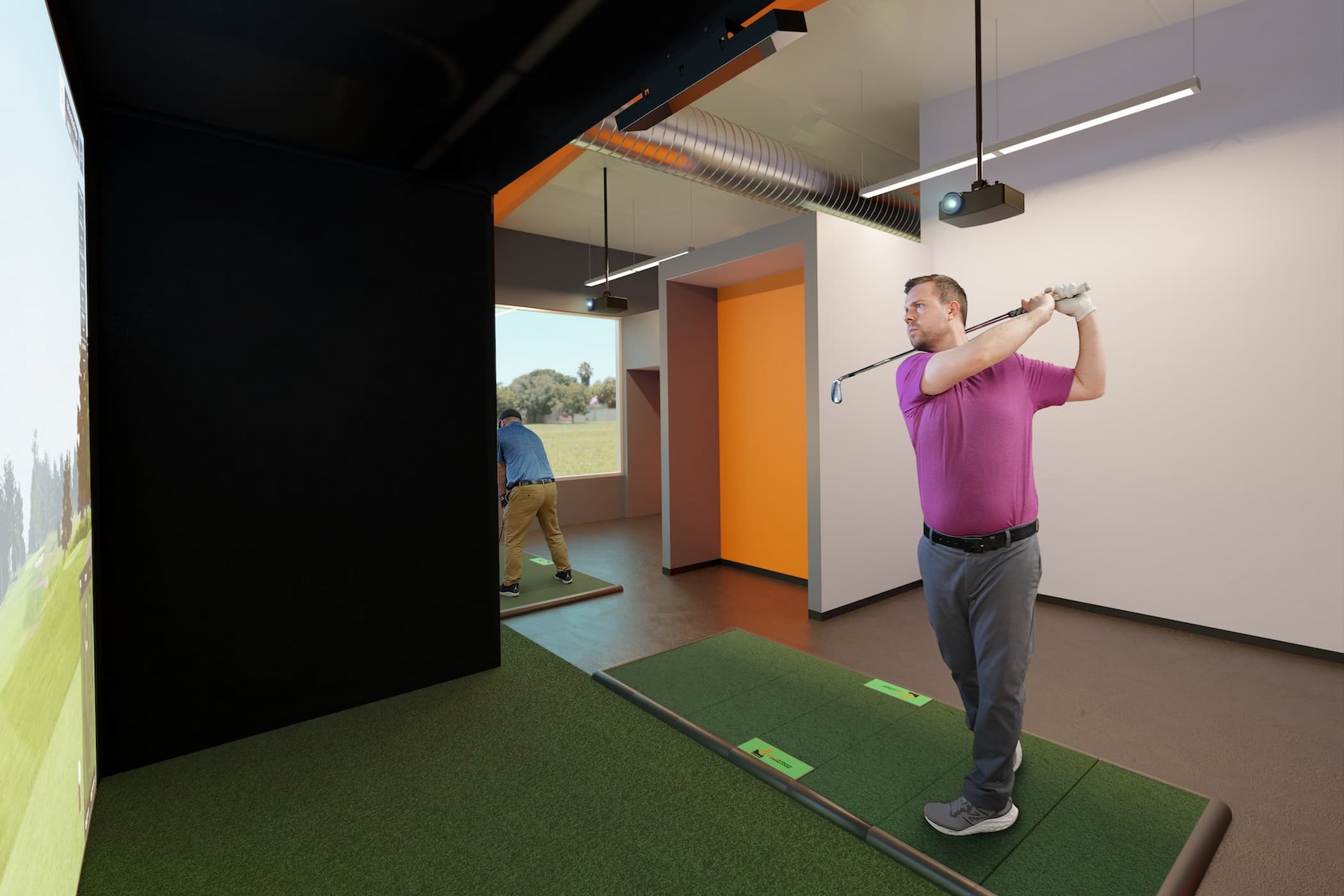 Golfer in Carl's Pro Enclosure inside commercial space